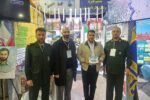 غرفه تربیت بدنی سپاه عاشورا توجه قهرمان المپیک را جلب کرد